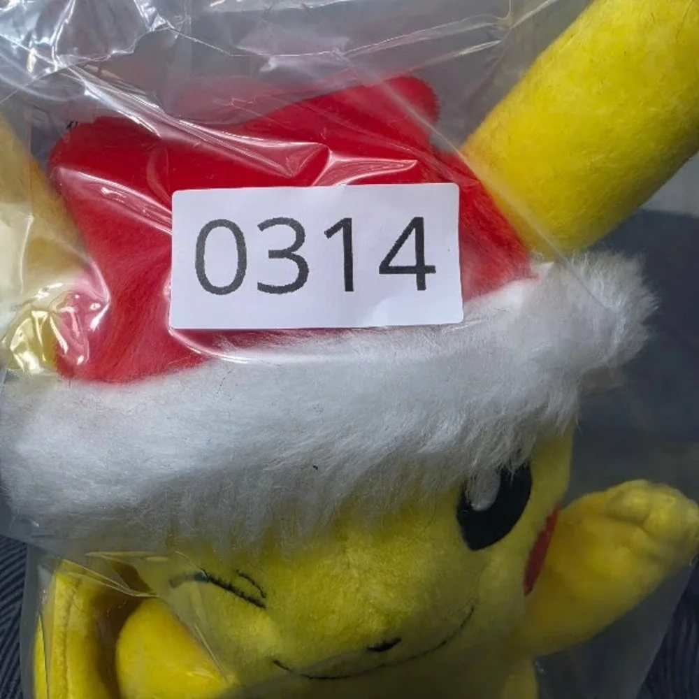 TOMY Pokemon 2017 Winking Pikachu Plush Santa Christmas Hat 8: Stuffed Animal